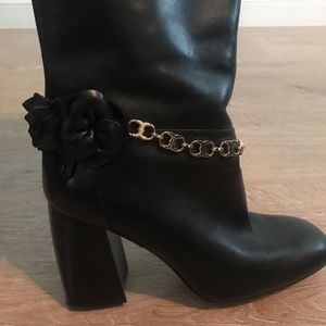 Tory Burch knee high boots.